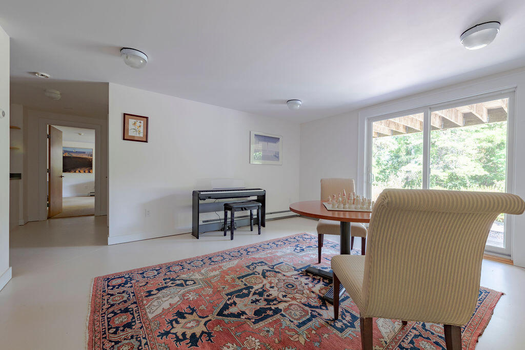 10 Hamblen Farm Road Wellfleet, MA 02667 - Photo 38 of 59 a living room with furniture and a window