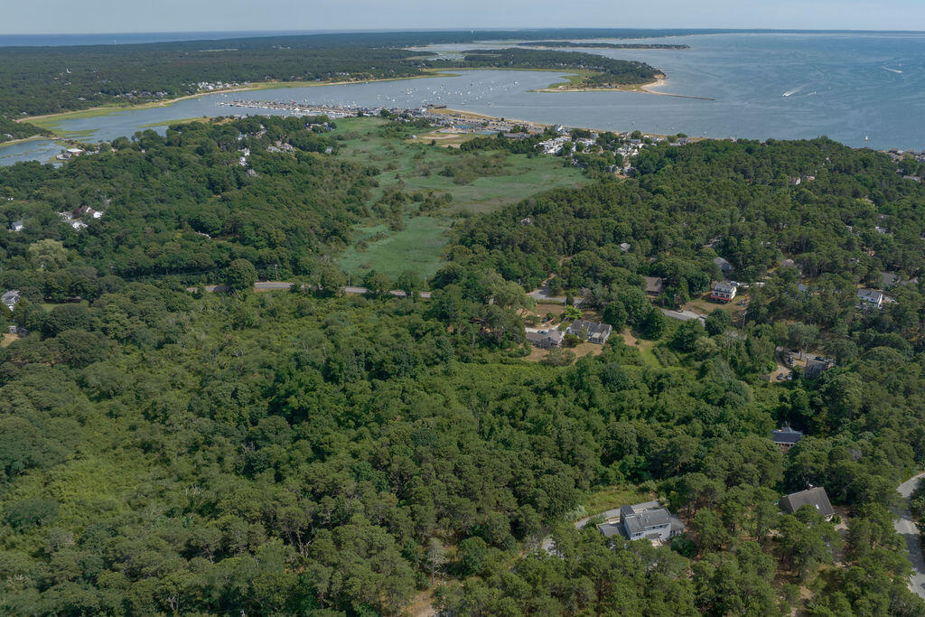 10 Hamblen Farm Road Wellfleet, MA 02667 - Photo 49 of 59 an aerial view of a houses with a lake