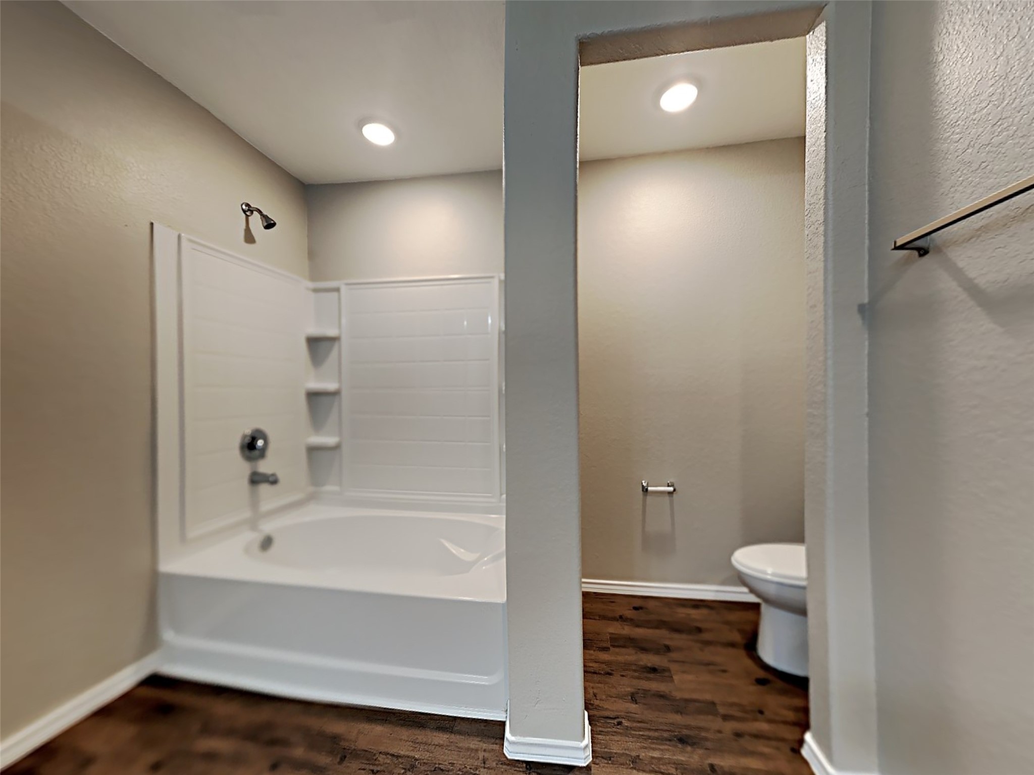15451 Refugio Verde Way Houston, TX 77049 - Photo 20 of 20 a bathroom with a bathtub and a toilet