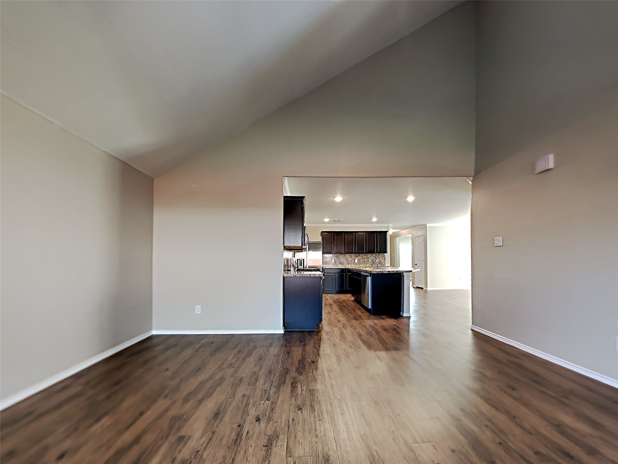 15451 Refugio Verde Way Houston, TX 77049 - Photo 9 of 20 a kitchen with a refrigerator and a stove top oven