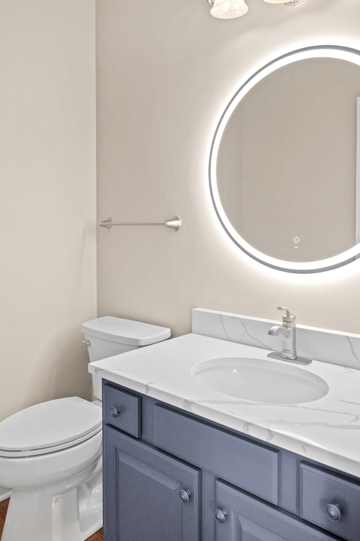 28798 Rivers Edge Drive Cary, IL 60013 - Photo 12 of 46 a bathroom with a sink and a mirror