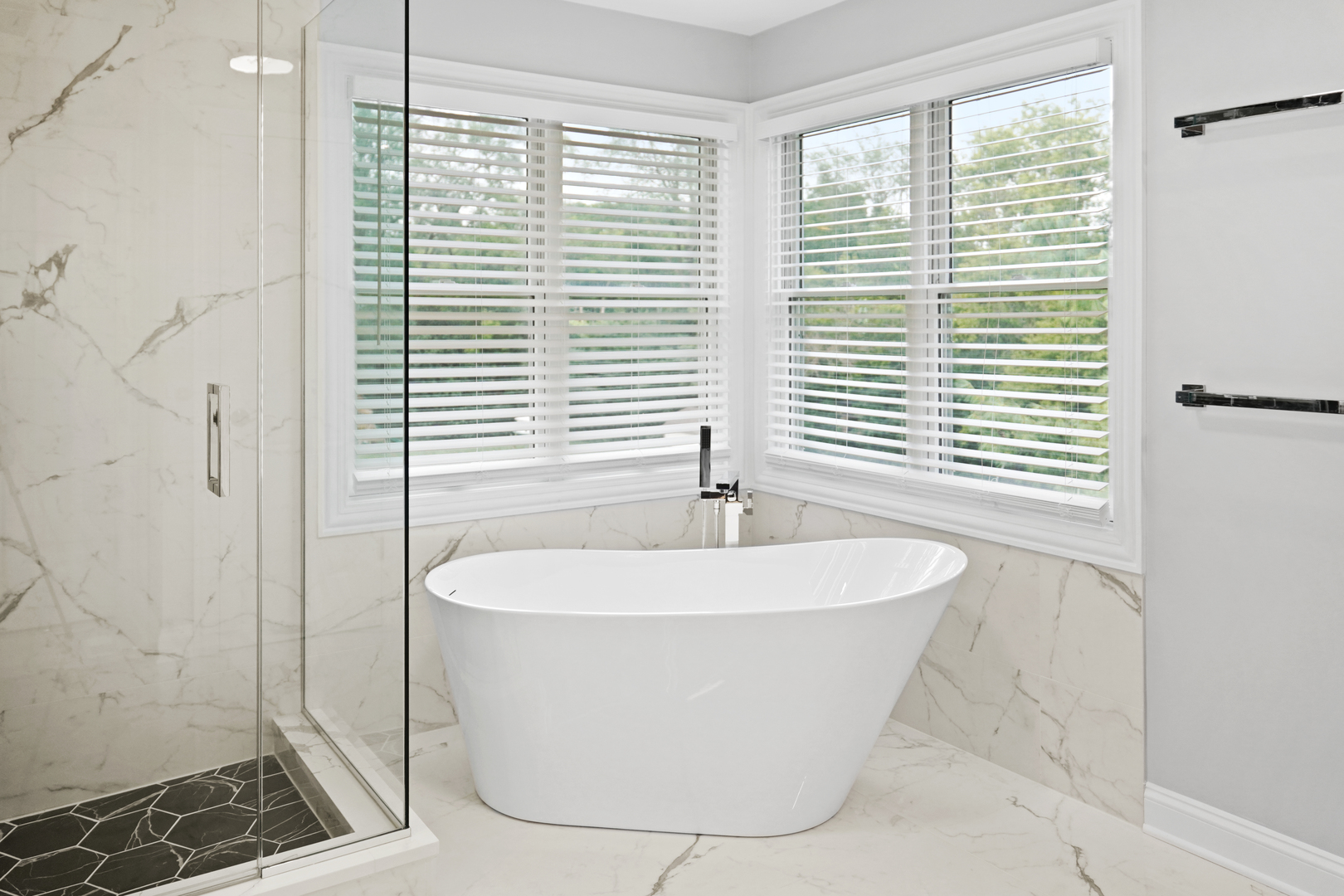 28798 Rivers Edge Drive Cary, IL 60013 - Photo 15 of 46 a white bath tub sitting in a bathroom next to a window