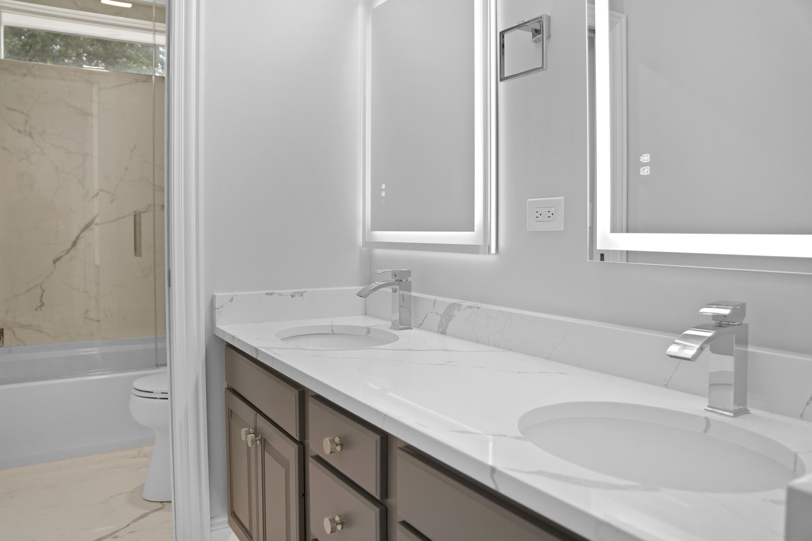 28798 Rivers Edge Drive Cary, IL 60013 - Photo 20 of 46 a bathroom with a granite countertop sink and a bathtub