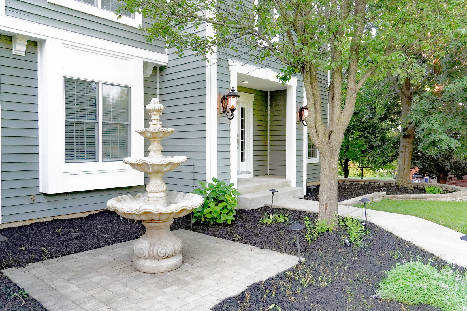 28798 Rivers Edge Drive Cary, IL 60013 - Photo 2 of 46 a view of a house with backyard and sitting area