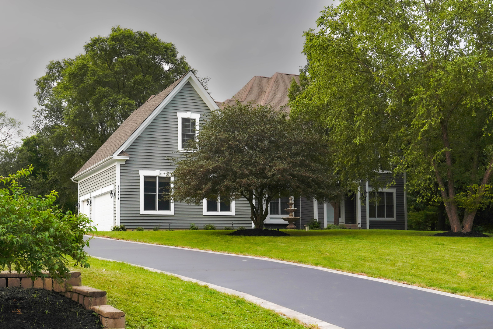 28798 Rivers Edge Drive Cary, IL 60013 - Photo 3 of 46 a view of a house with swimming pool and yard