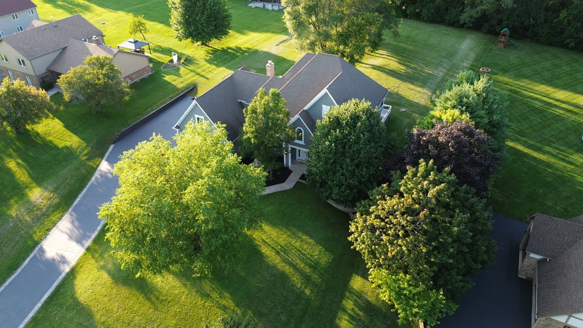 28798 Rivers Edge Drive Cary, IL 60013 - Photo 37 of 46 an aerial view of a house with a garden and lake view
