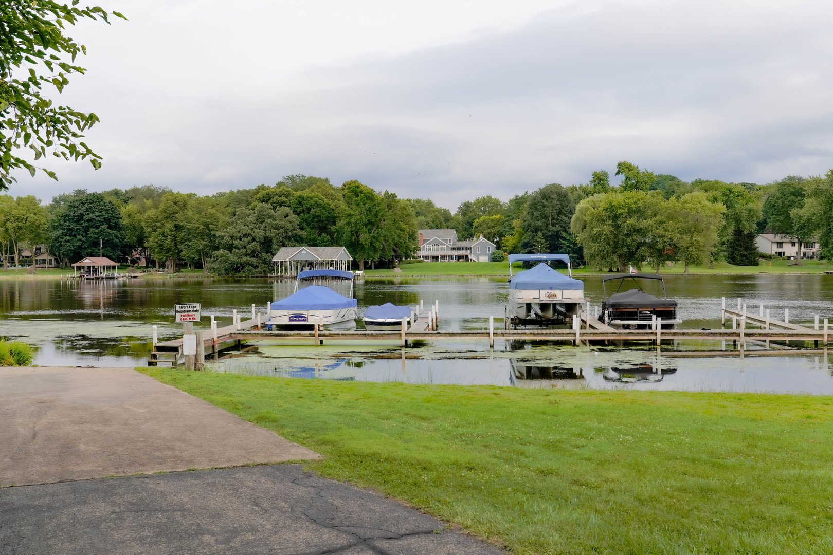 28798 Rivers Edge Drive Cary, IL 60013 - Photo 41 of 46 a swimming pool with outdoor seating and barbeque oven