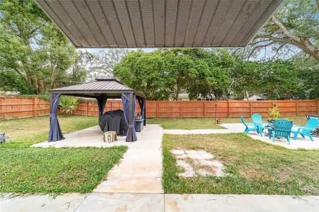 an aerial view of residential house with outdoor space