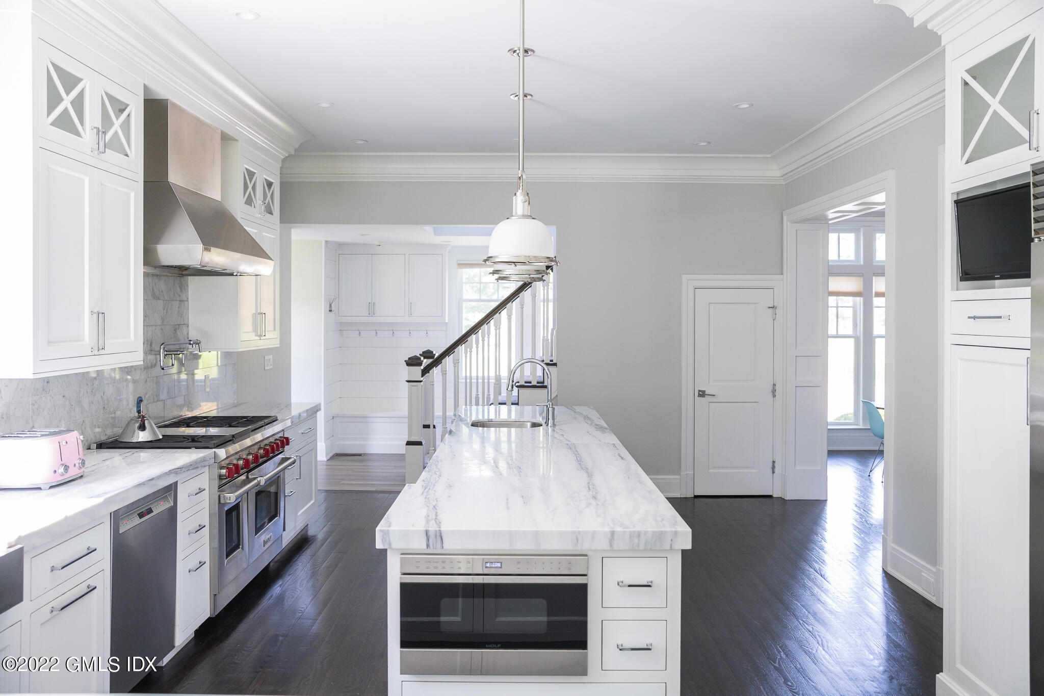 311 Stanwich Road Greenwich, CT 06830 - Photo 19 of 65 a kitchen with stove and cabinets