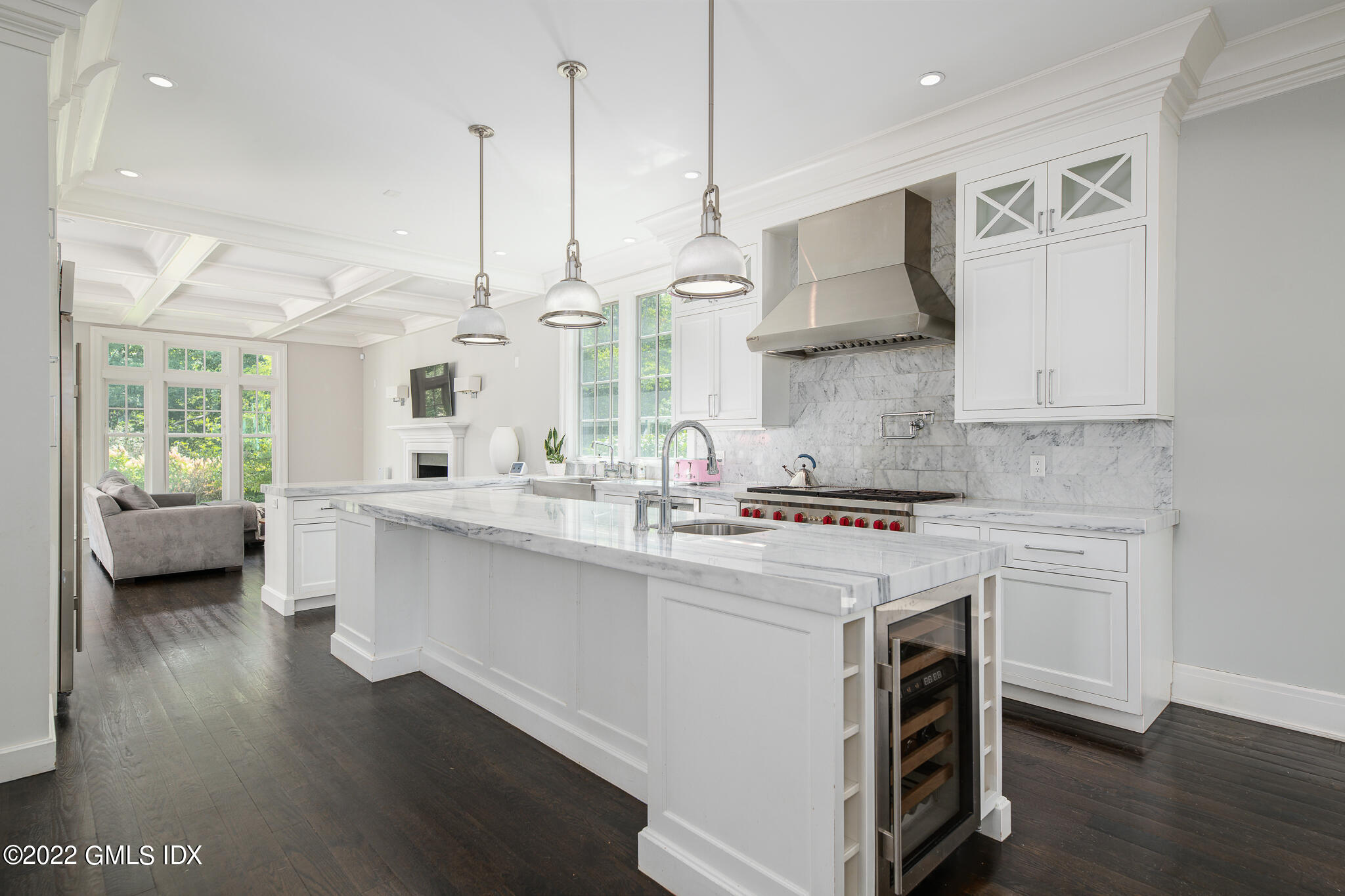311 Stanwich Road Greenwich, CT 06830 - Photo 21 of 65 a kitchen with stainless steel appliances granite countertop a stove a sink and a wooden floors