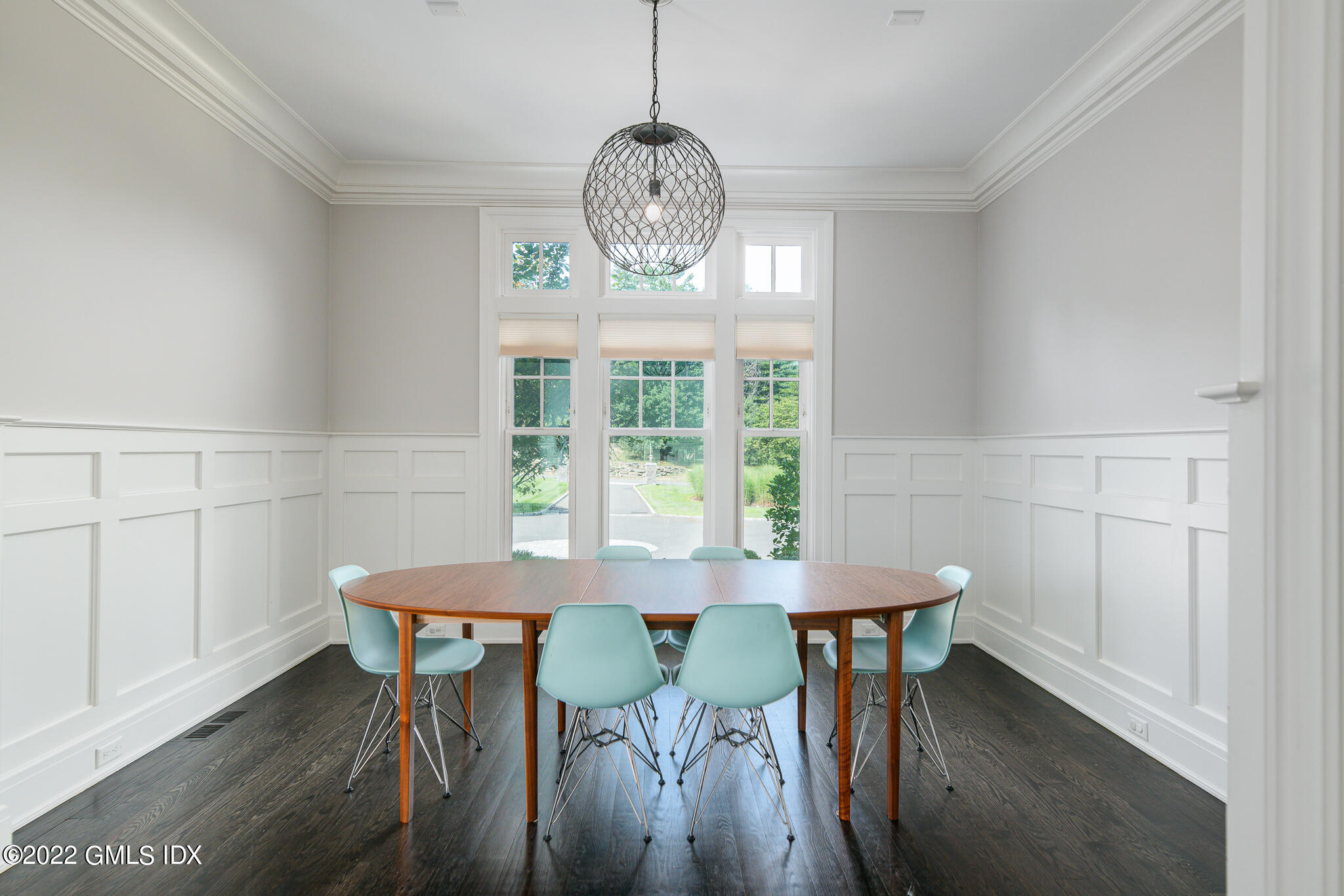 311 Stanwich Road Greenwich, CT 06830 - Photo 28 of 65 a view of a dining room with furniture window and wooden floor
