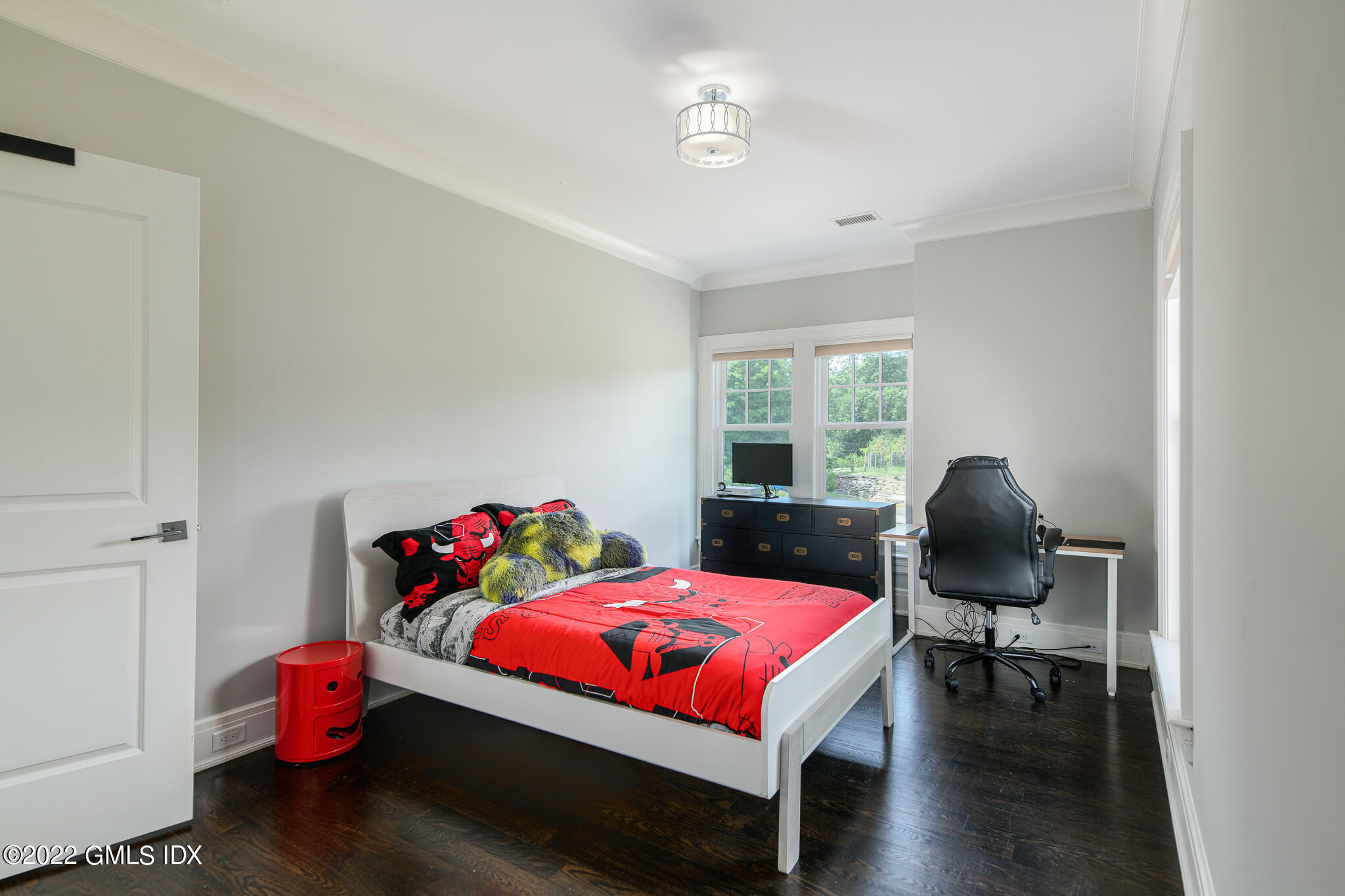 311 Stanwich Road Greenwich, CT 06830 - Photo 36 of 65 a bedroom with a bed chair and window