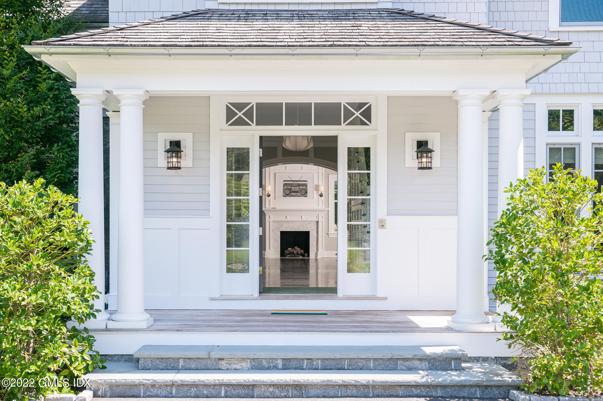 311 Stanwich Road Greenwich, CT 06830 - Photo 4 of 65 a front view of a house with plants