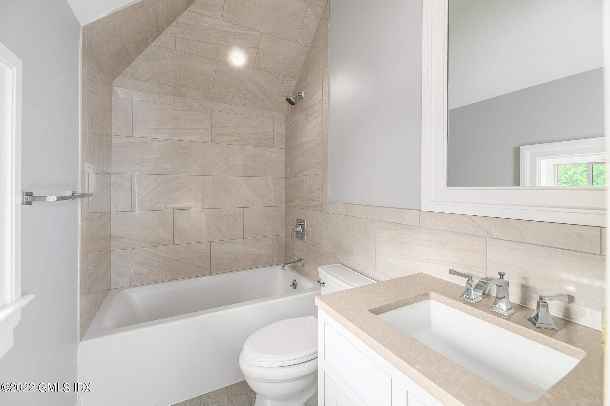 311 Stanwich Road Greenwich, CT 06830 - Photo 43 of 65 a bathroom with a sink toilet vanity and shower