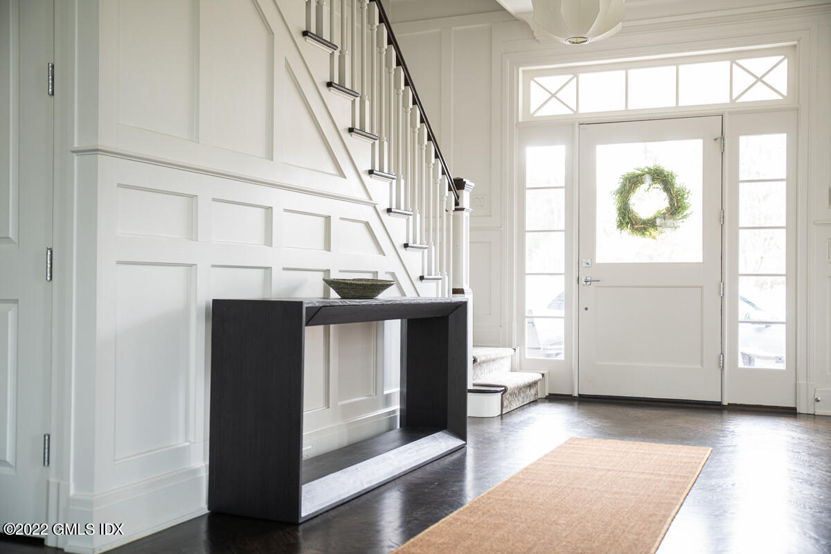 311 Stanwich Road Greenwich, CT 06830 - Photo 5 of 65 a view of entryway and hall with wooden floor