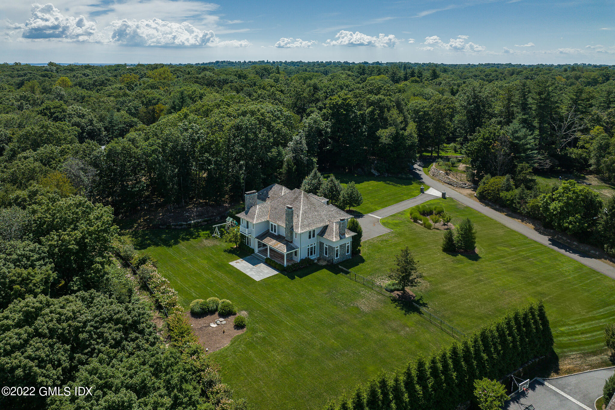 311 Stanwich Road Greenwich, CT 06830 - Photo 59 of 65 an aerial view of a house with a yard