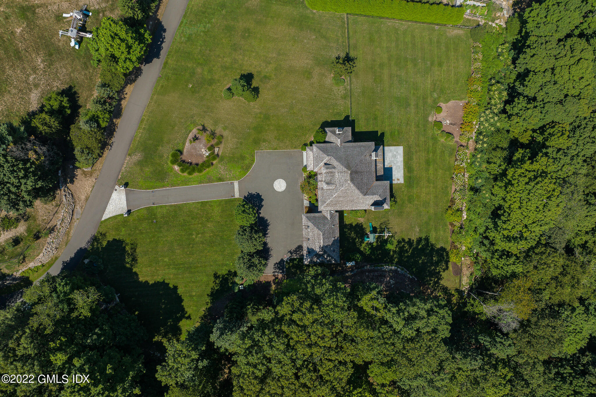 311 Stanwich Road Greenwich, CT 06830 - Photo 60 of 65 an aerial view of a house with a yard