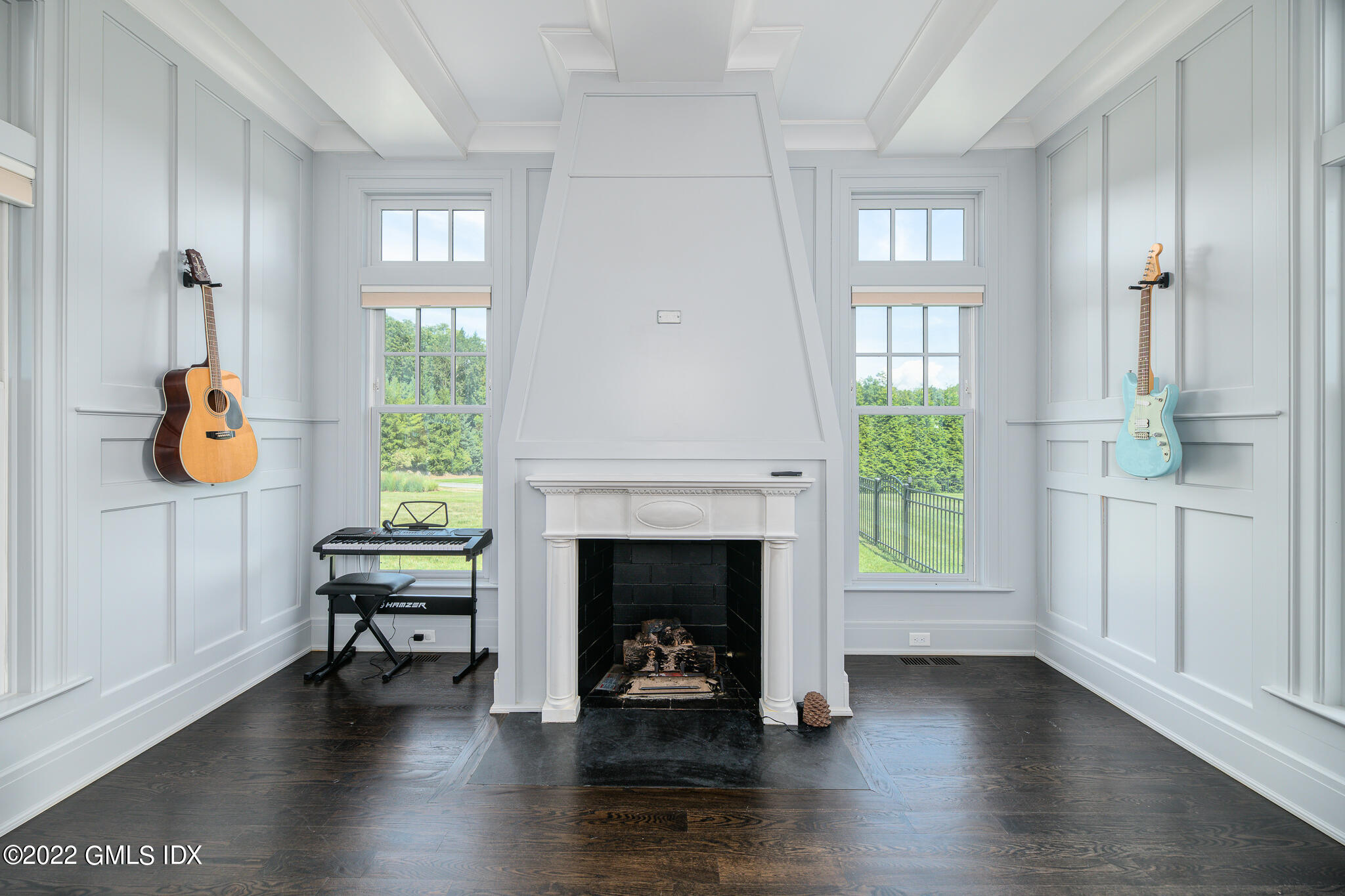 311 Stanwich Road Greenwich, CT 06830 - Photo 8 of 65 a living room with furniture and a fireplace