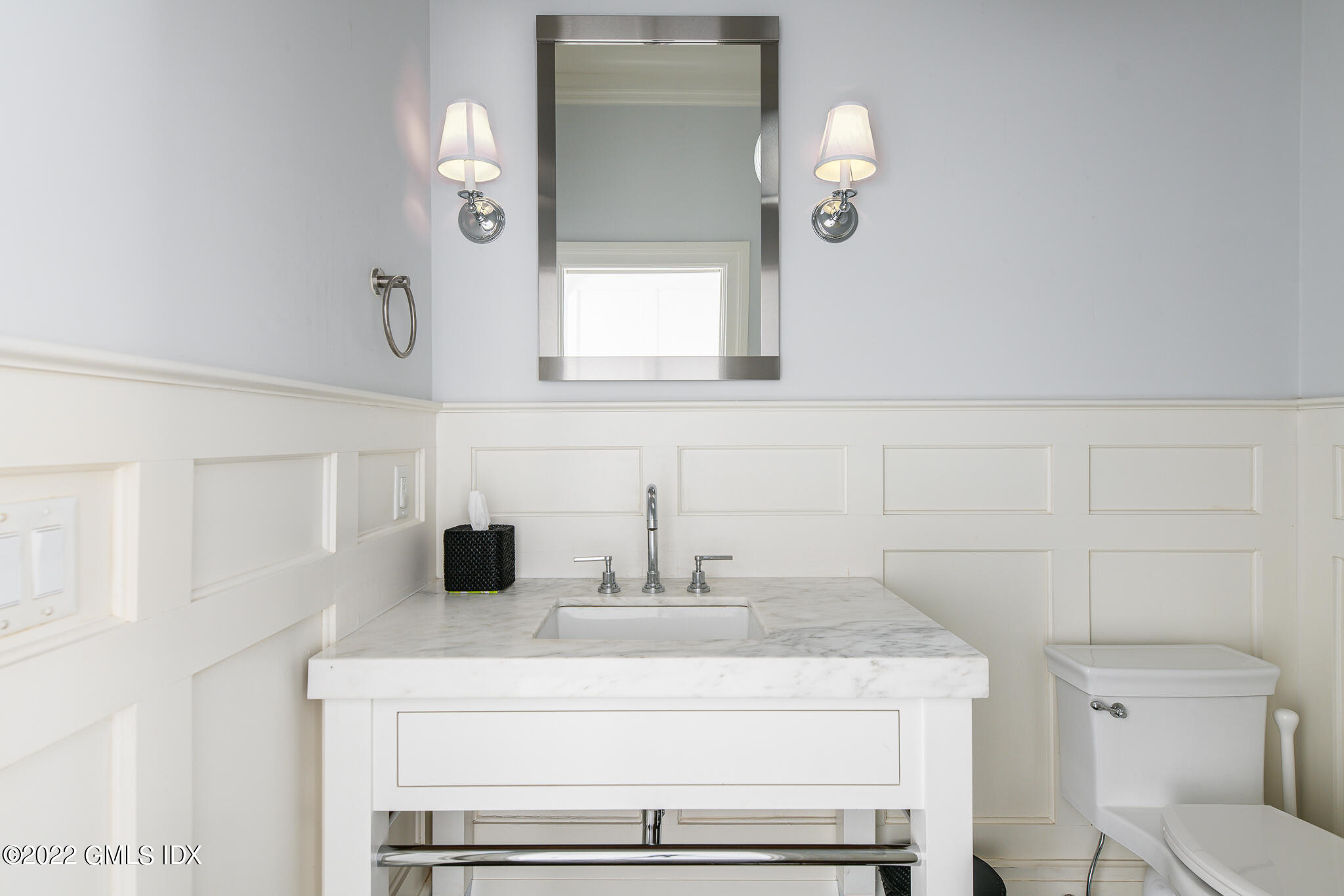 311 Stanwich Road Greenwich, CT 06830 - Photo 10 of 65 a bathroom with a sink and a mirror