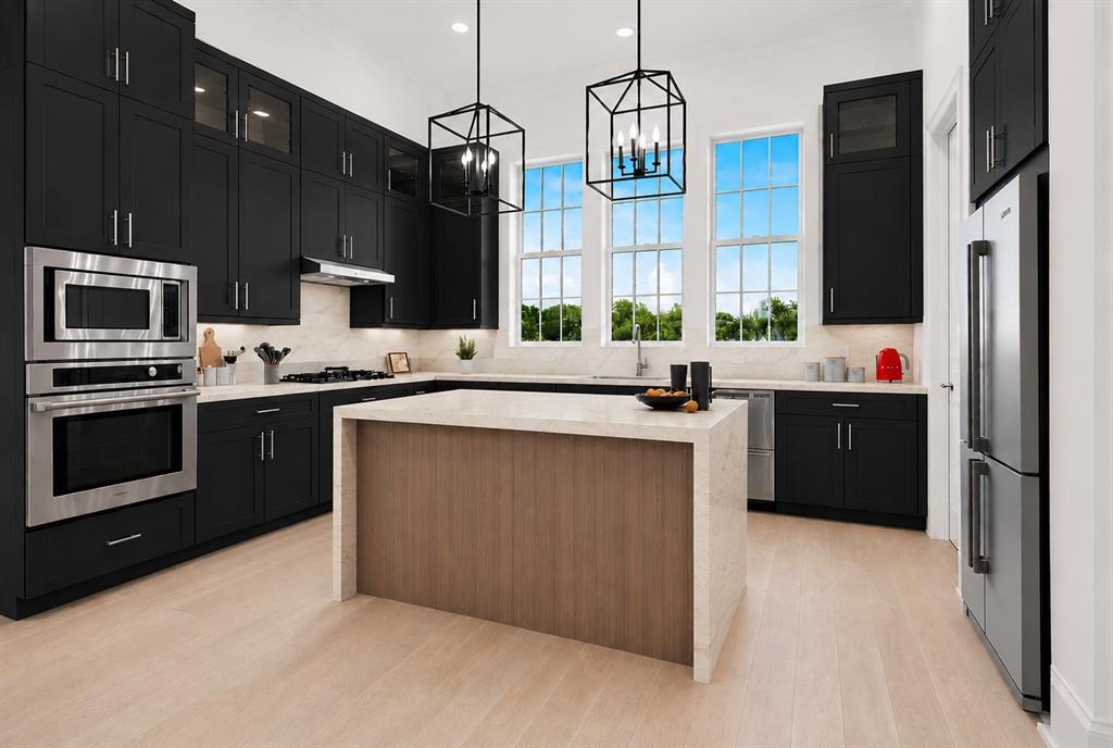 4080 Oak Street Addison, TX 75001 - Photo 1 of 19 a kitchen with stainless steel appliances a sink stove and refrigerator