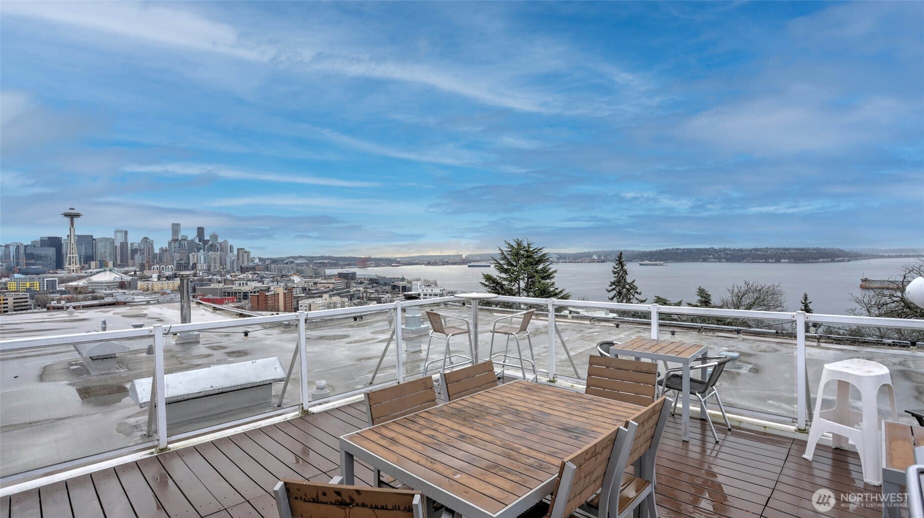 530 West Olympic Place, Unit 304 Seattle, WA 98119 - Photo 12 of 15 a view of a terrace with furniture