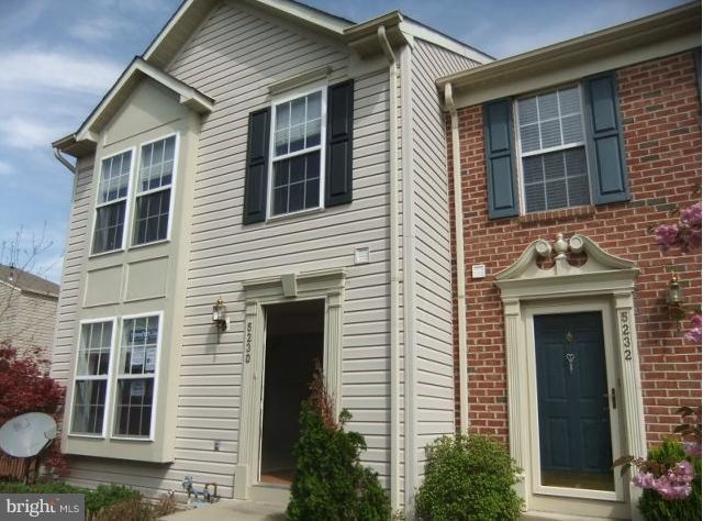 5230 Leavers Court Rosedale, MD 21237 - Photo 4 of 10 a front view of a house with a yard