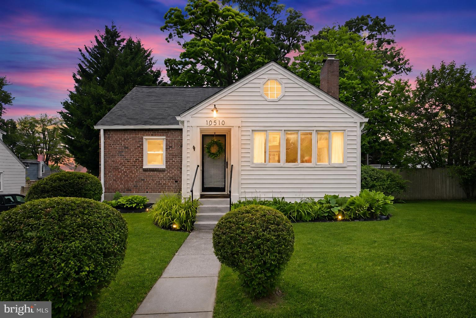 10510 Hayes Avenue Silver Spring, MD 20902 - Photo 1 of 24 Warm and welcoming curb appeal at dusk