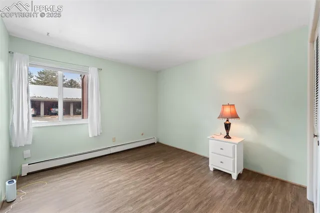 a view of a livingroom with furniture and window