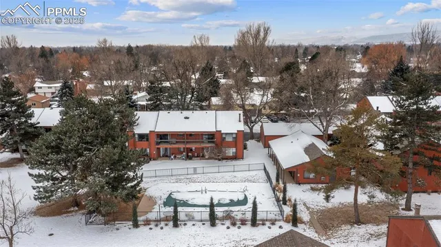 an aerial view of a city with lots of residential buildings