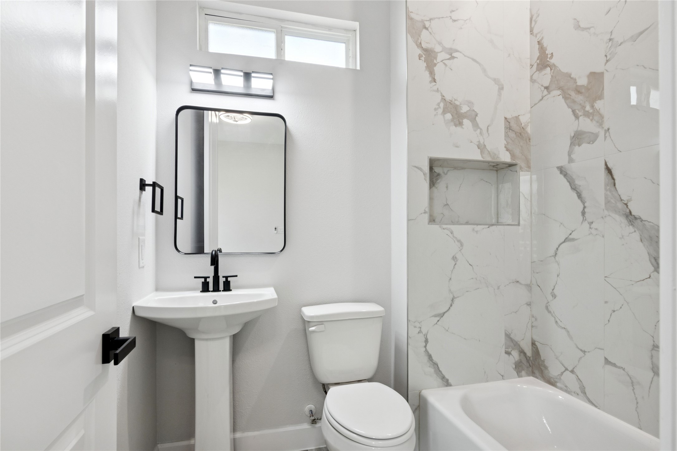 5766 Ward Bend Road Sealy, TX 77474 - Photo 25 of 45 a bathroom with a toilet sink and mirror