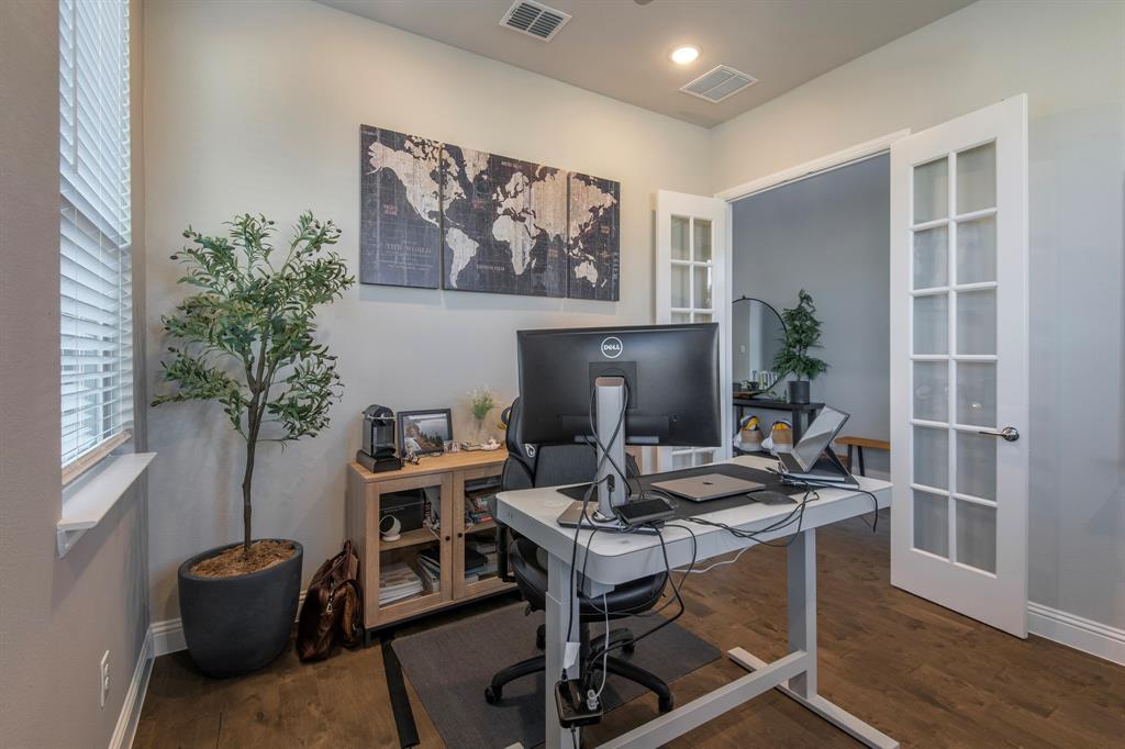 16650 Nightshade Road Frisco, TX 75033 - Photo 5 of 40 a view of a workspace with furniture and a potted plant