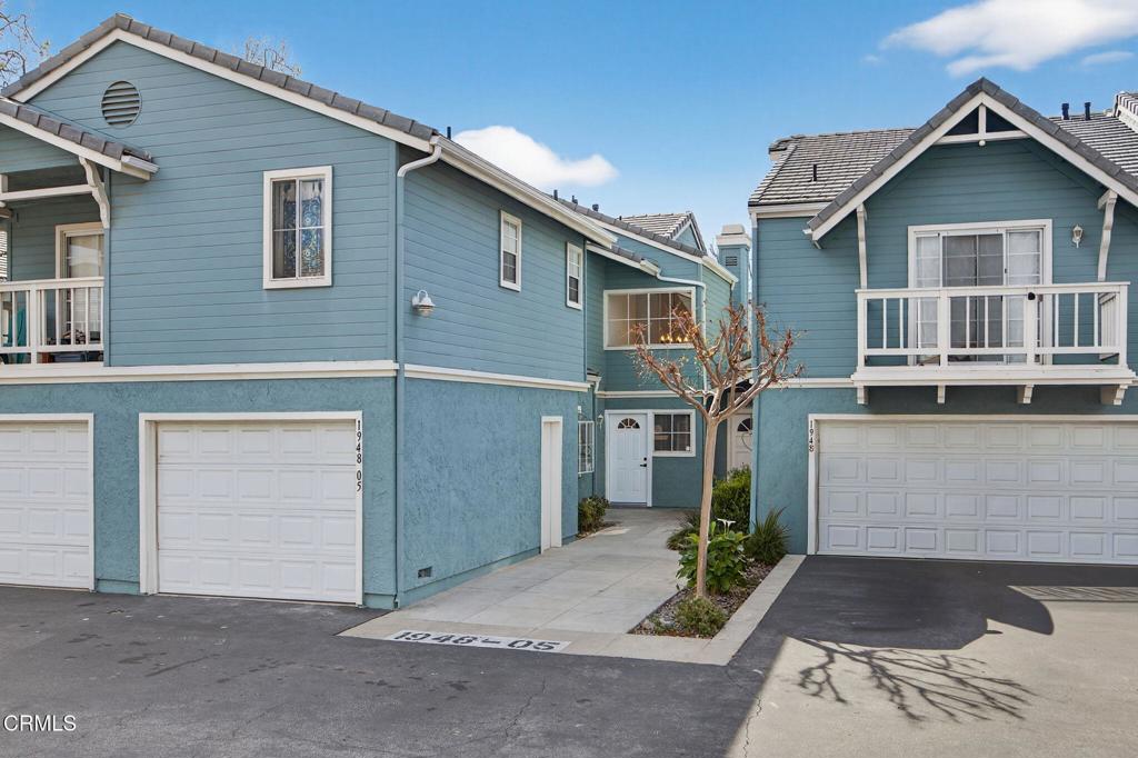 1948 Rory Lane, Unit 5 Simi Valley, CA 93063 - Photo 1 of 25 a front view of a house with garden