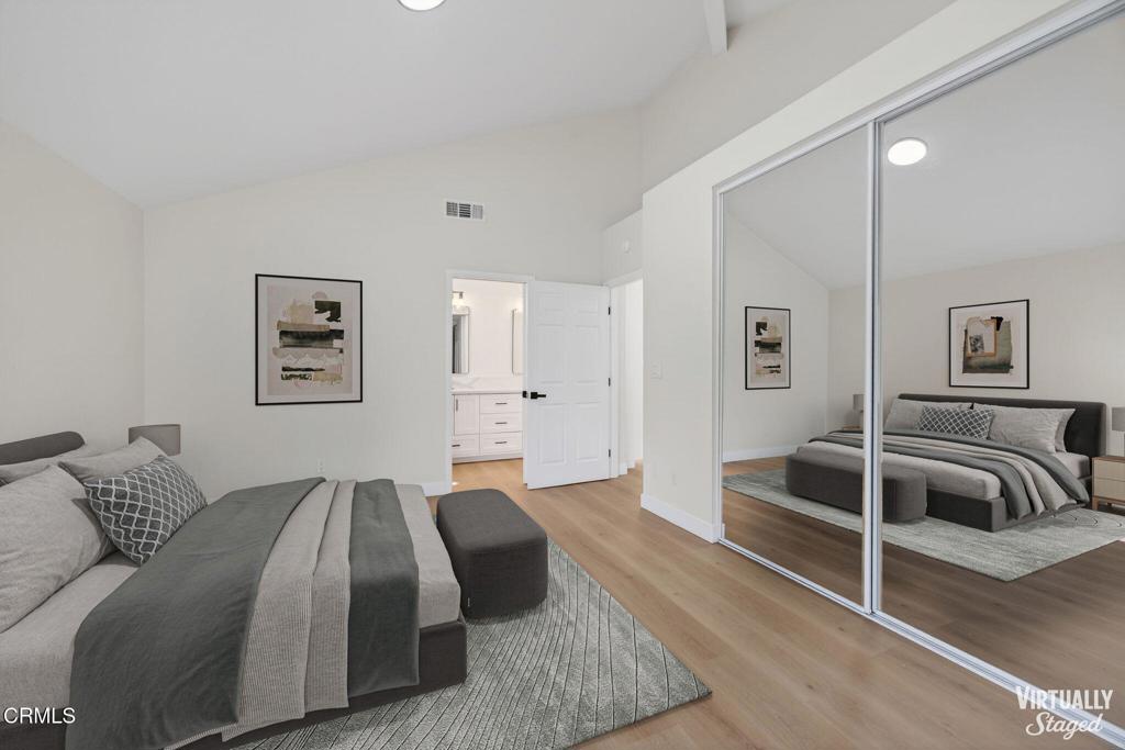 1948 Rory Lane, Unit 5 Simi Valley, CA 93063 - Photo 14 of 25 a spacious bedroom with a bed and couch