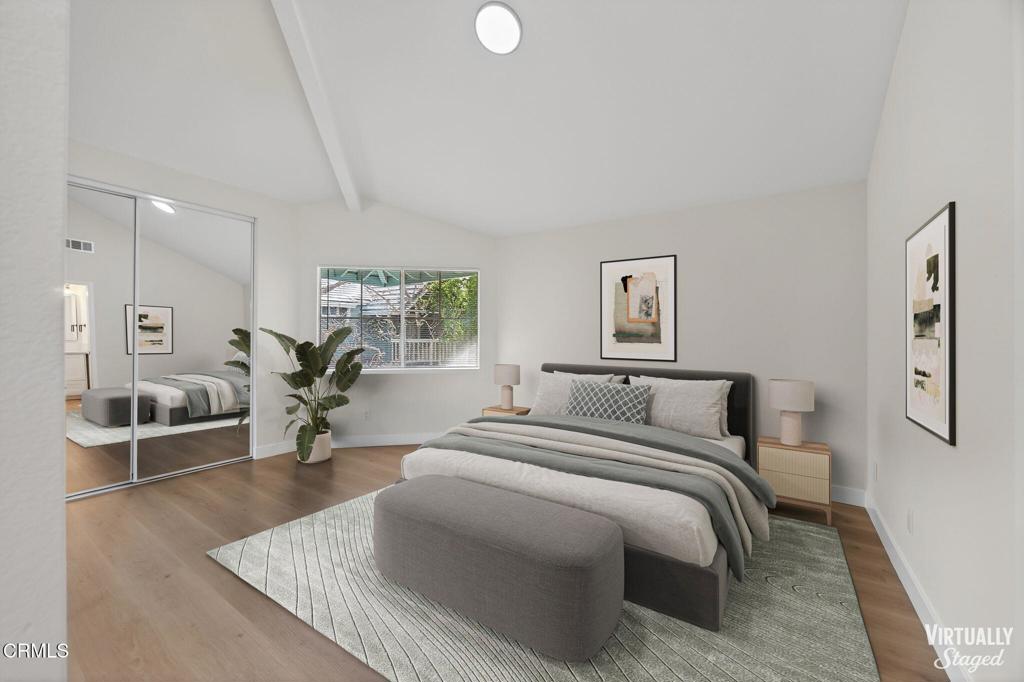 1948 Rory Lane, Unit 5 Simi Valley, CA 93063 - Photo 15 of 25 a bedroom with a bed and couch