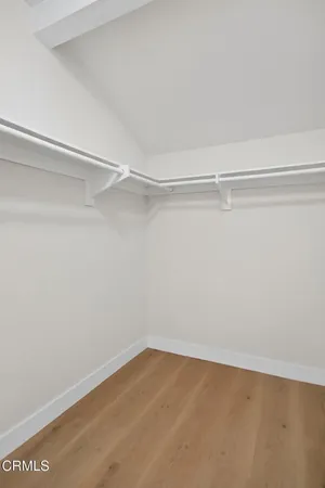 a view of an empty walk in closet
