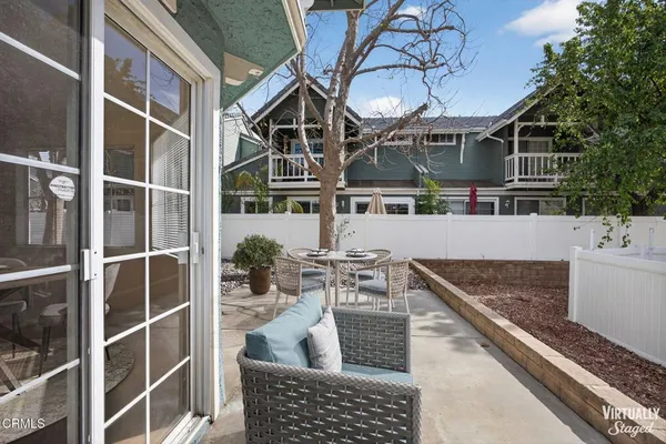 a view of house and outdoor space with swimming pool