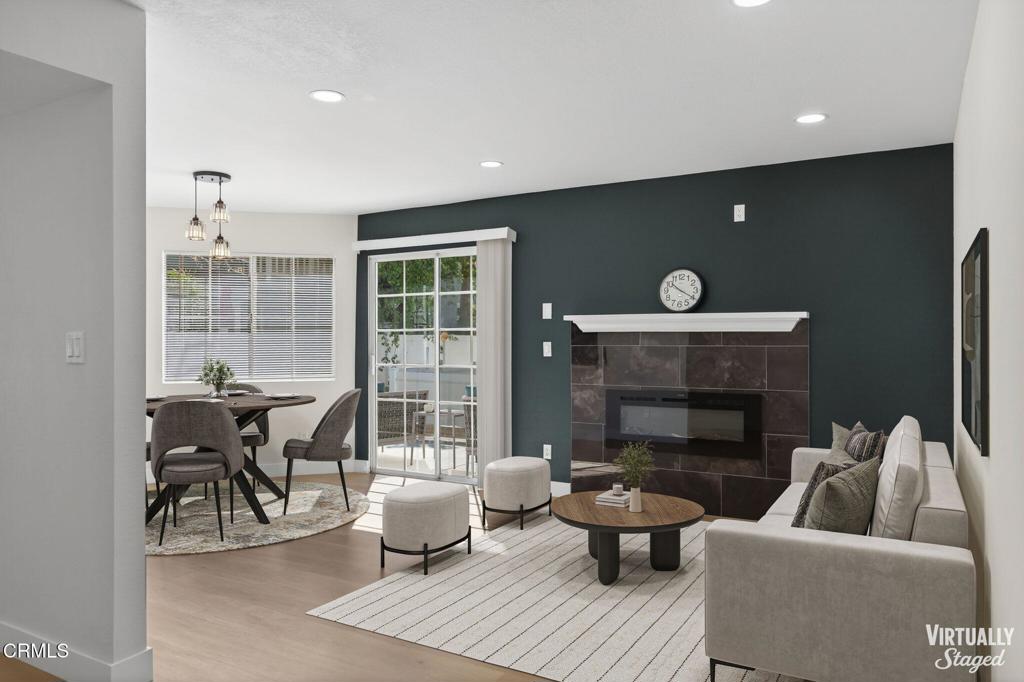 1948 Rory Lane, Unit 5 Simi Valley, CA 93063 - Photo 7 of 25 a living room with furniture and a fireplace