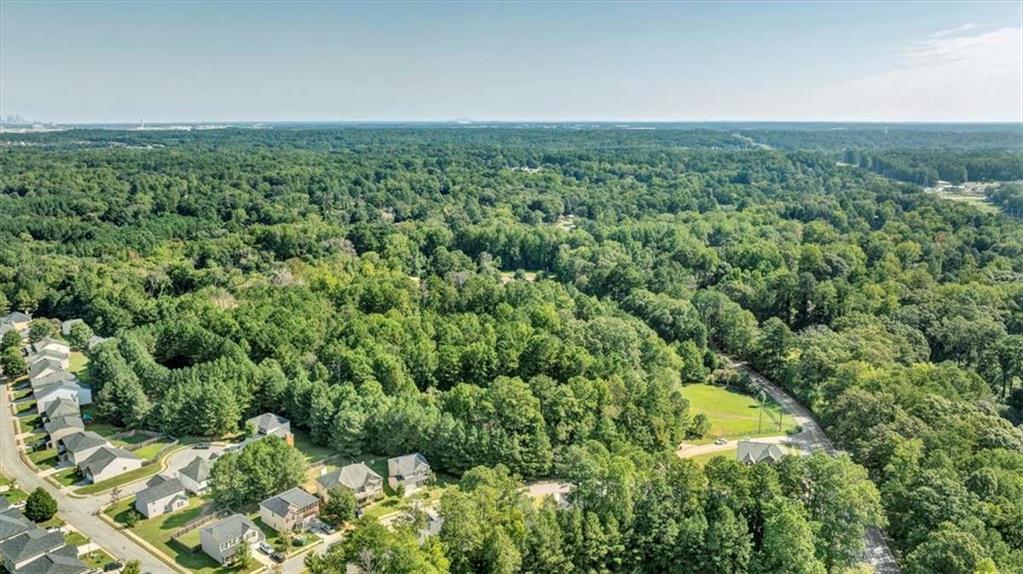 6765 Dagenhart Road Atlanta, GA 30349 - Photo 7 of 27 a view of a green field