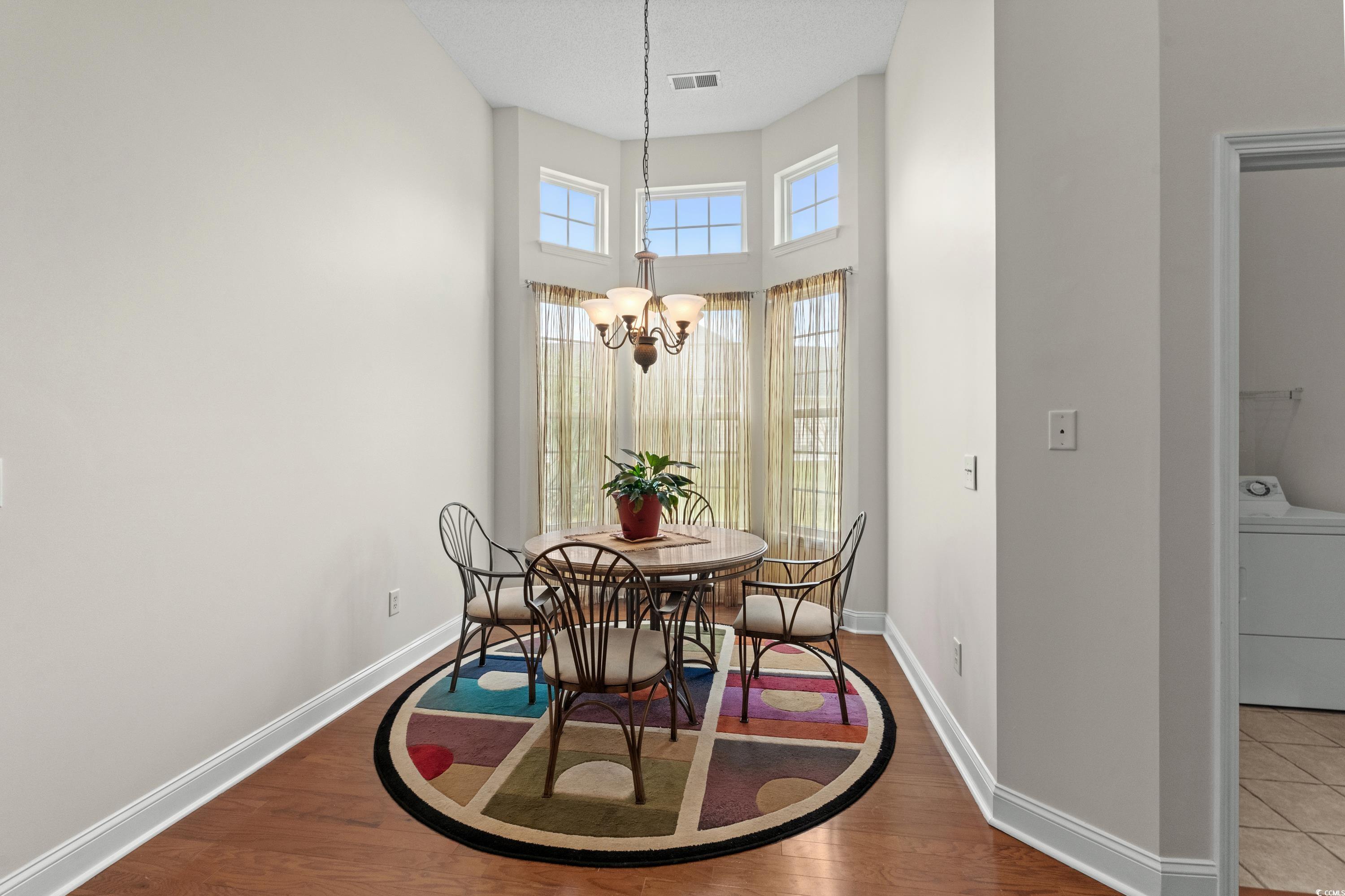 5025 Westwind Drive Myrtle Beach, SC 29579 - Photo 18 of 36 Dining room featuring washer / clothes dryer, base