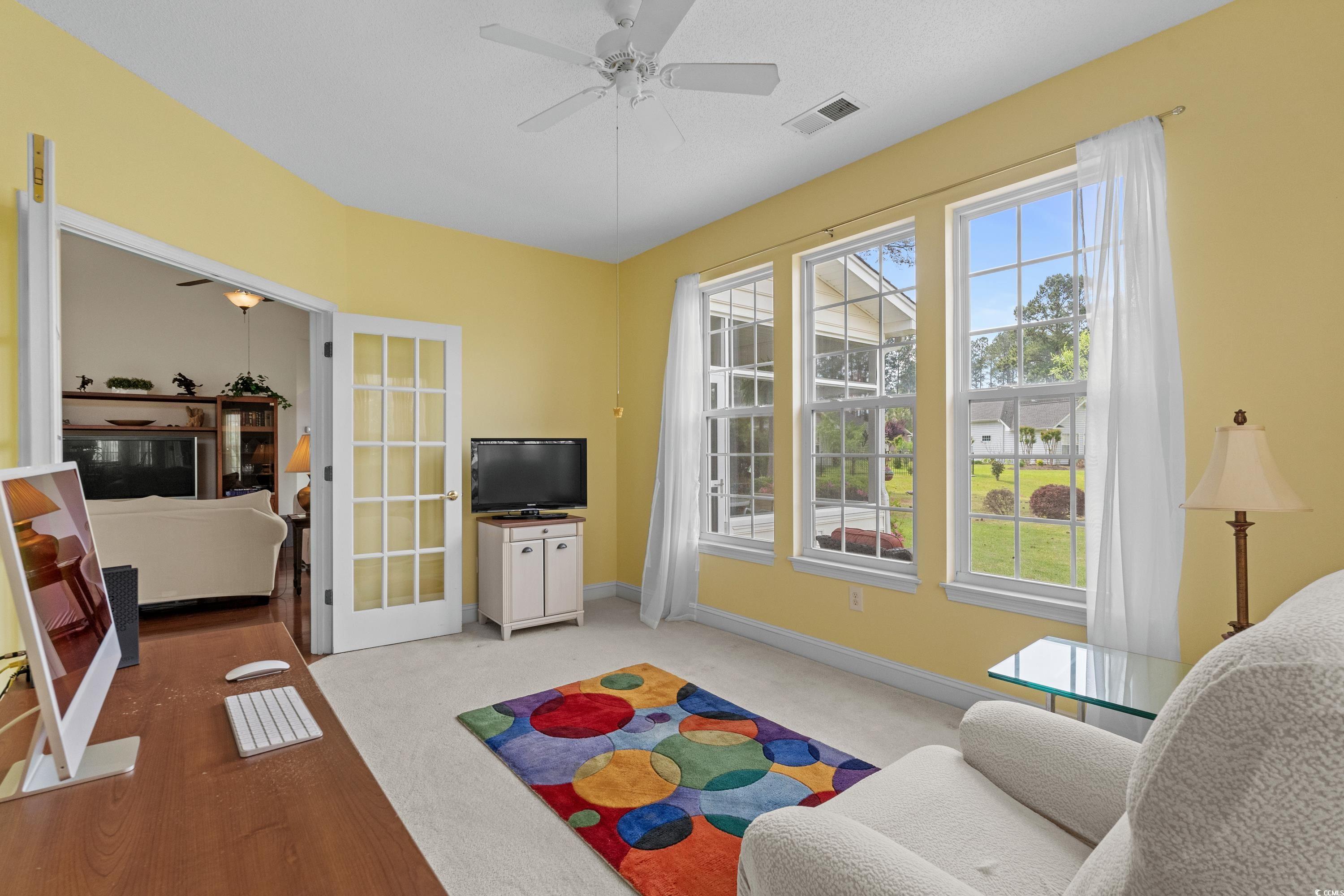 5025 Westwind Drive Myrtle Beach, SC 29579 - Photo 20 of 36 Living room with visible vents, baseboards, a ceil