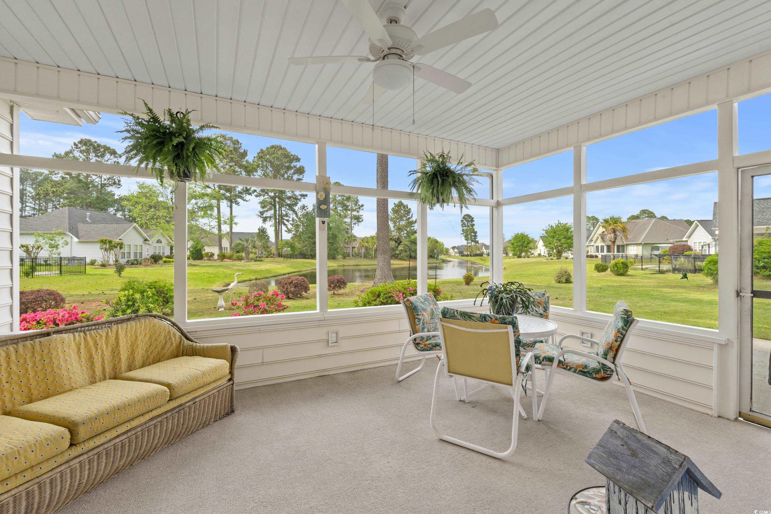 5025 Westwind Drive Myrtle Beach, SC 29579 - Photo 21 of 36 Sunroom / solarium featuring a water view, a wealt