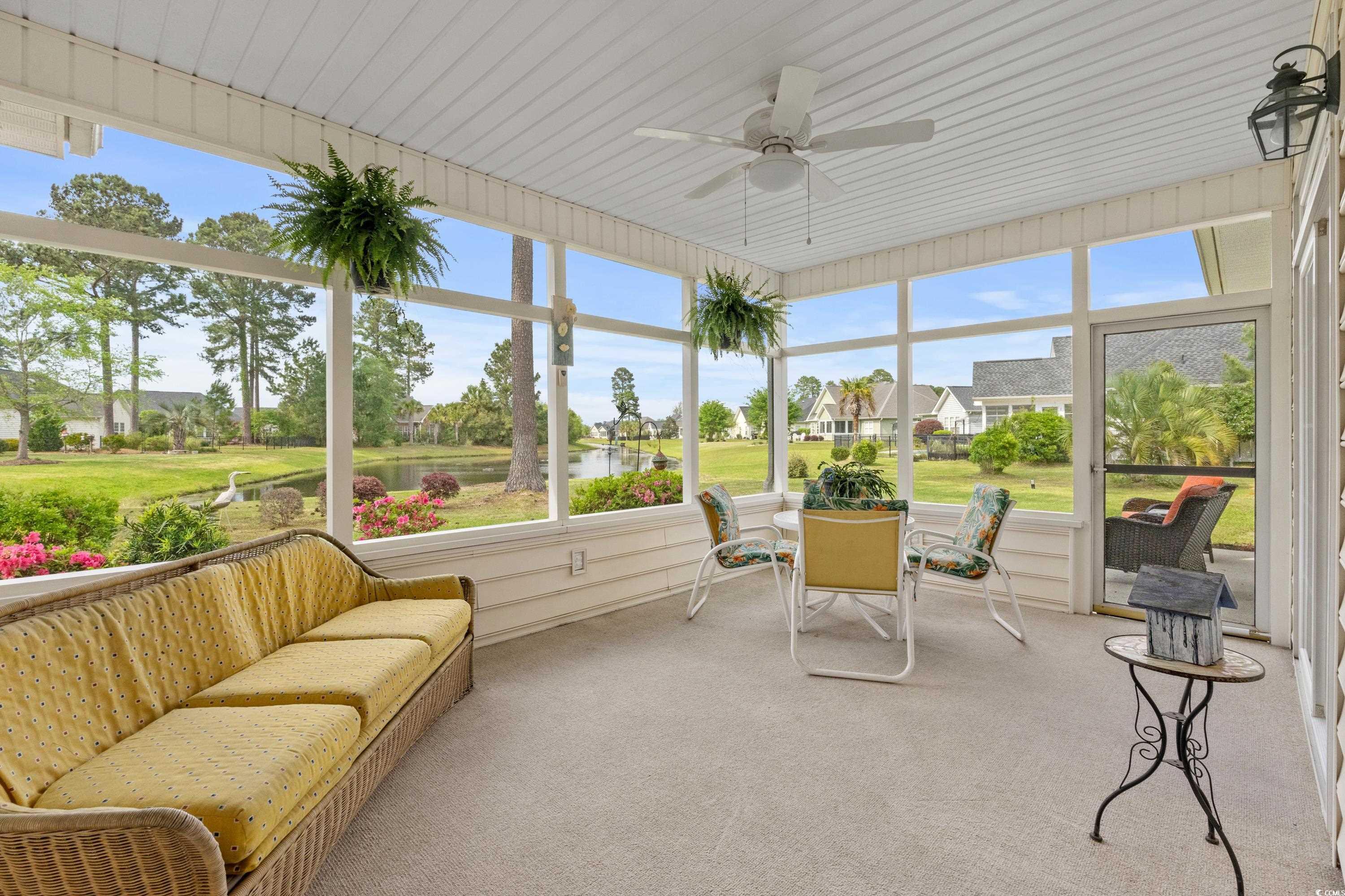 5025 Westwind Drive Myrtle Beach, SC 29579 - Photo 22 of 36 Sunroom / solarium featuring outdoor lounge area,