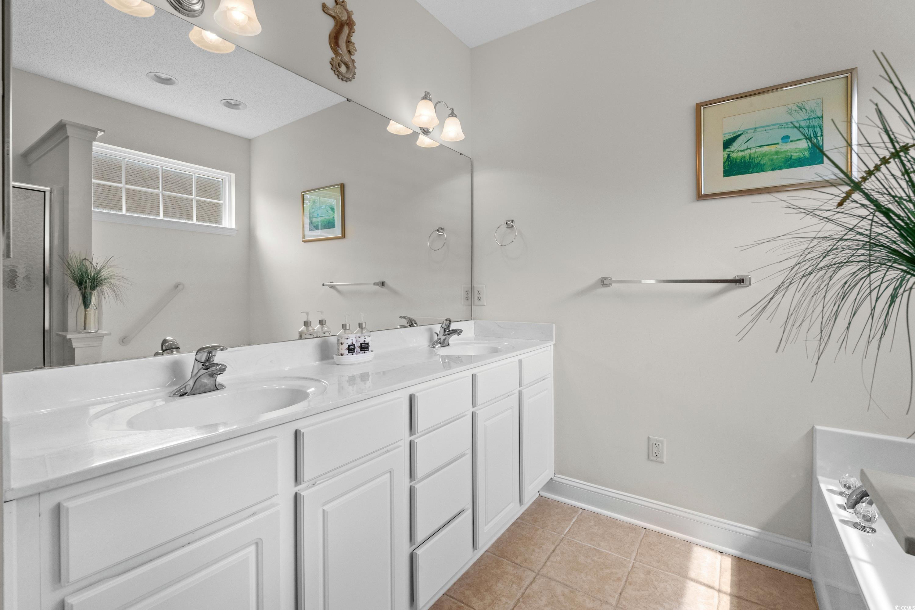 5025 Westwind Drive Myrtle Beach, SC 29579 - Photo 30 of 36 Full bath featuring tile patterned floors, double