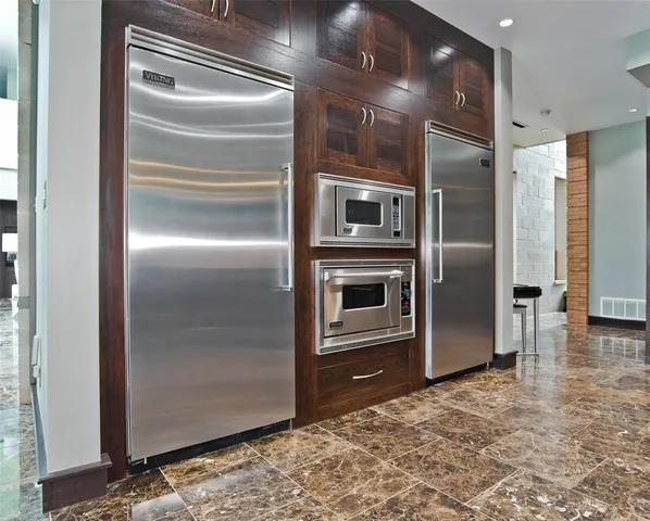 a living room with furniture window and wooden floor