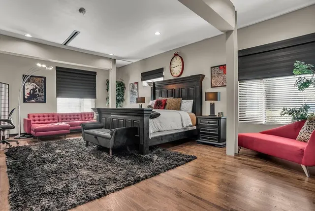 a view of a livingroom with furniture and washing machine