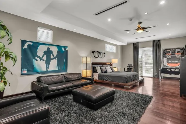a view of a chair and table in backyard