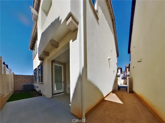 a view of a hallway with staircase