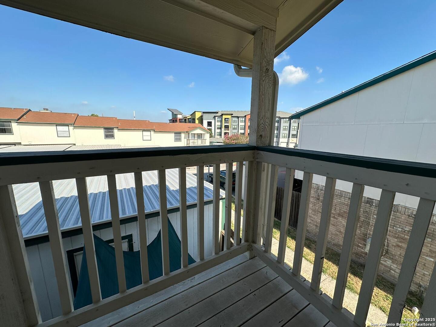 4949 Hamilton Wolfe Road, Unit 8201 San Antonio, TX 78229 - Photo 13 of 16 a view of wooden balcony