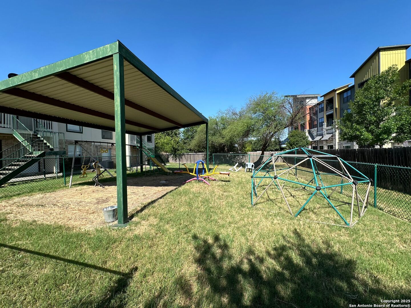 4949 Hamilton Wolfe Road, Unit 8201 San Antonio, TX 78229 - Photo 16 of 16 a view of backyard with swimming pool and porch
