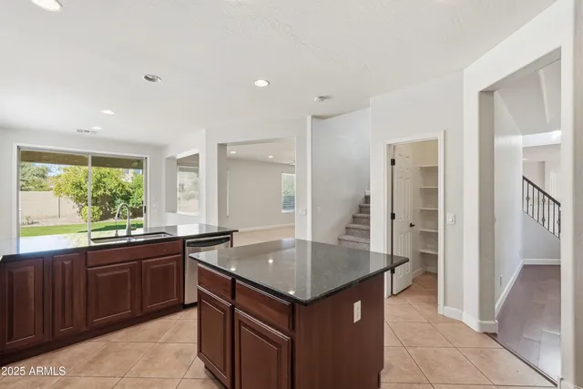 a kitchen with a stove and a sink